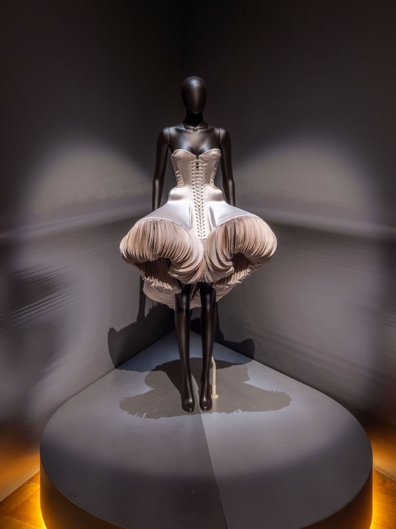 Mannequin in couture dress upon a pedestal highlighting Art & Imagination at The Capital Hotel, Apartments and Townhouse