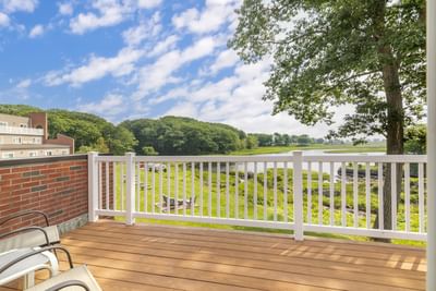 Balcony overlooking the river and grounds at Ogunquit River Inn