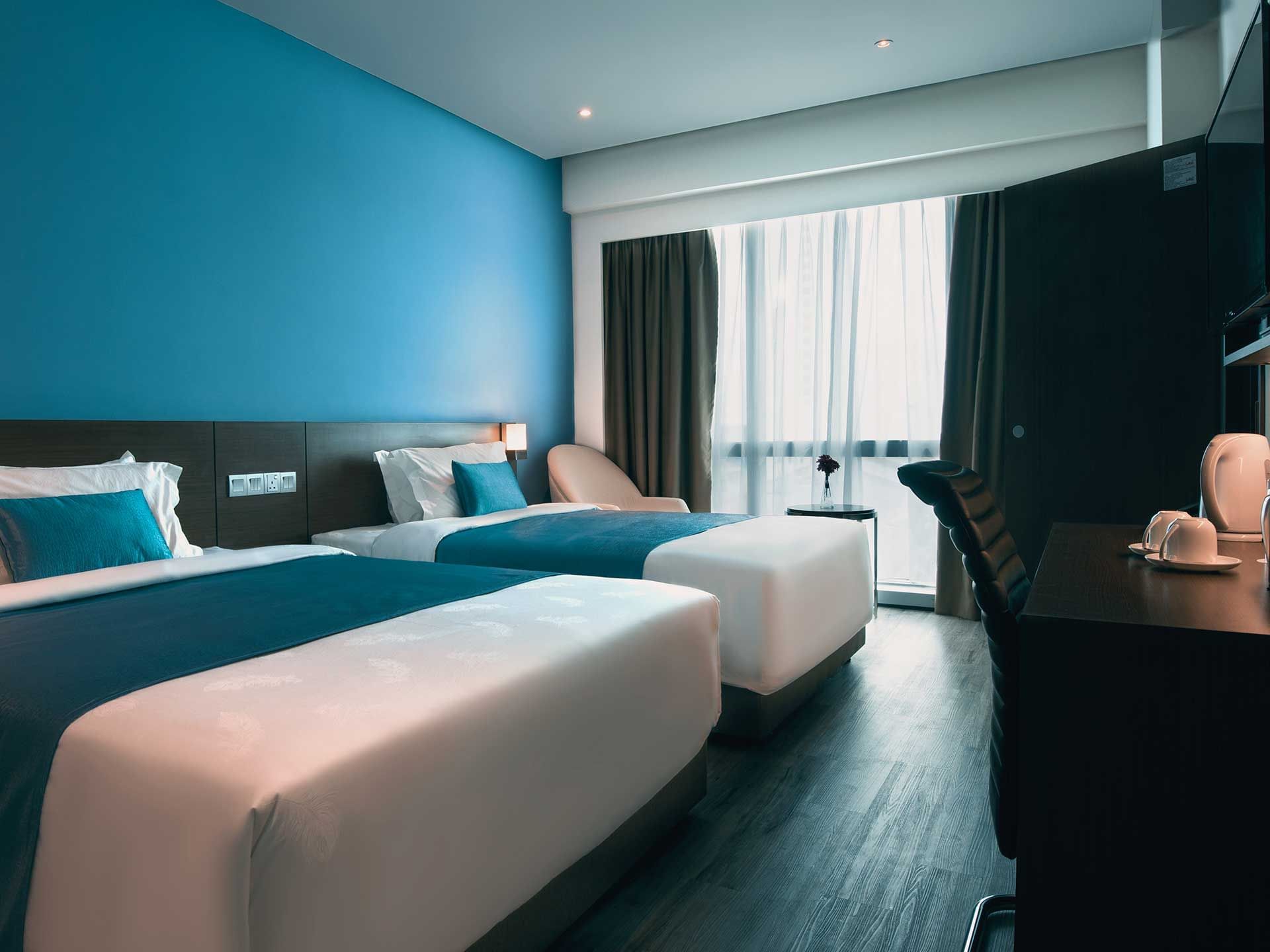 2 Beds & workspace in a room at Riverside Majestic Hotel Astana Wing