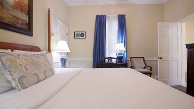 King bed & lounger in Classic King Room at Hotel St. Pierre