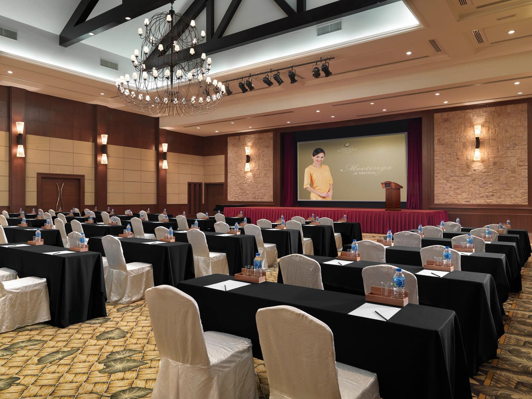 Classroom type tables in a Meeting Room at Pelangi Resort