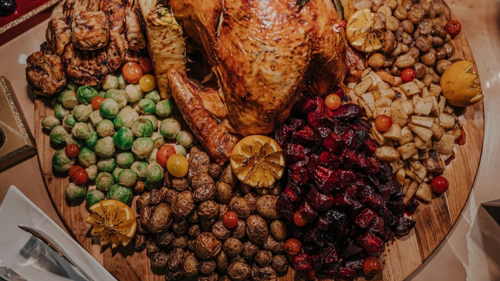 Thanksgiving dinner platter arranged on a board served at Paramount Hotels
