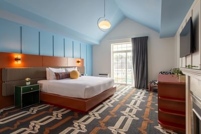 Large guest room with a bed at Driftaway Hotel and Pool