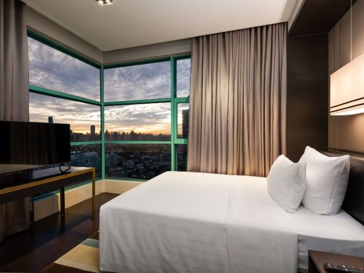 King bed in Presidential Suite with city view, Chatrium Hotels