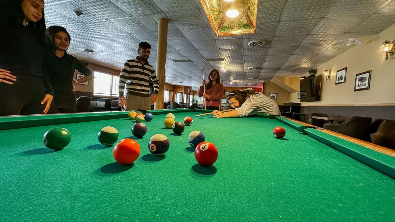 People playing pool at the Sluice Box Lounge