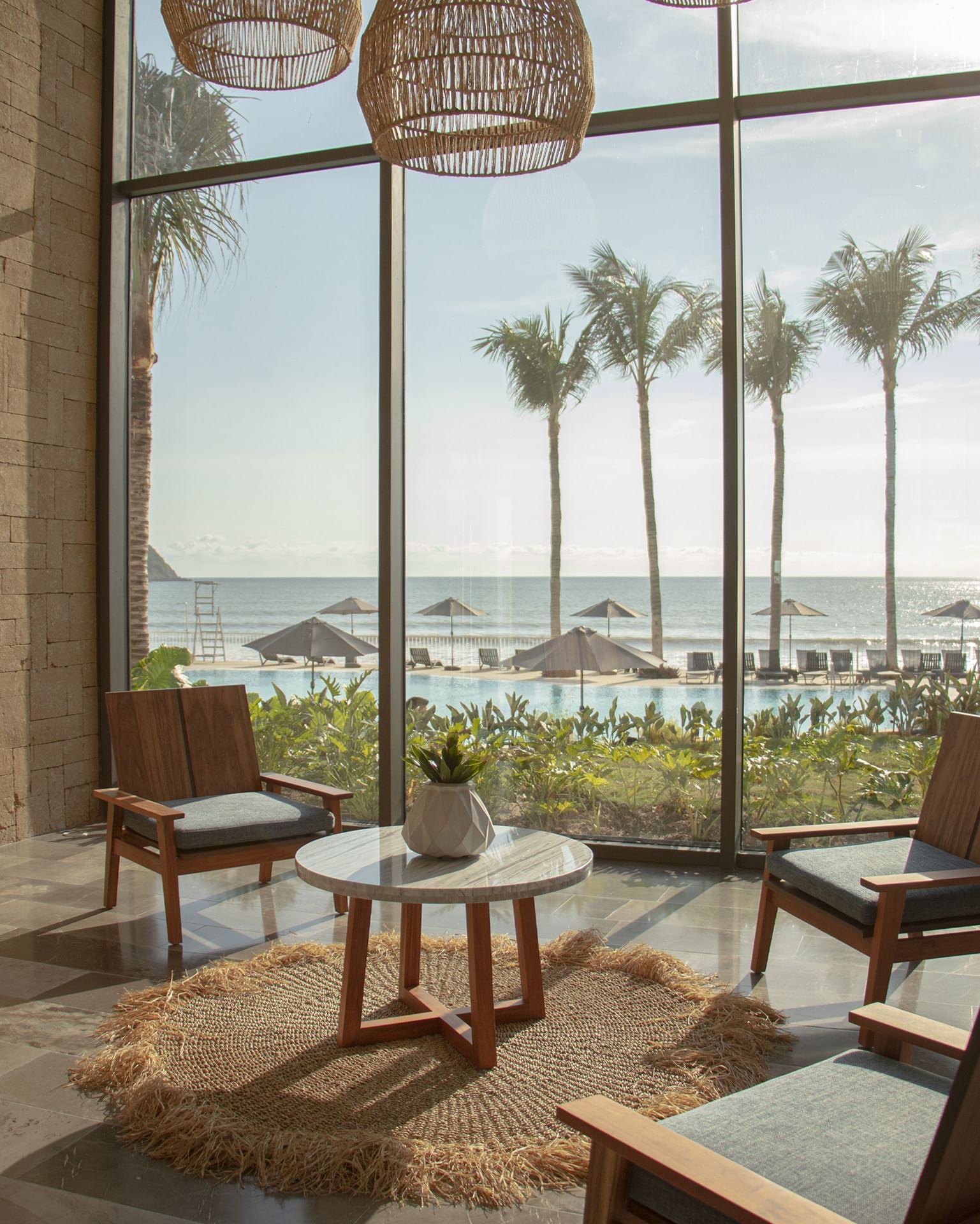 View of pool and ocean from lobby at Viaggio Resort Mazatlan