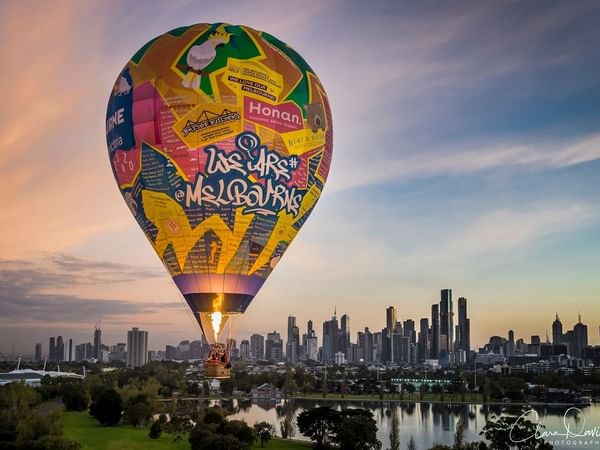 Hot air balloon by the city near Amora Hotel Melbourne