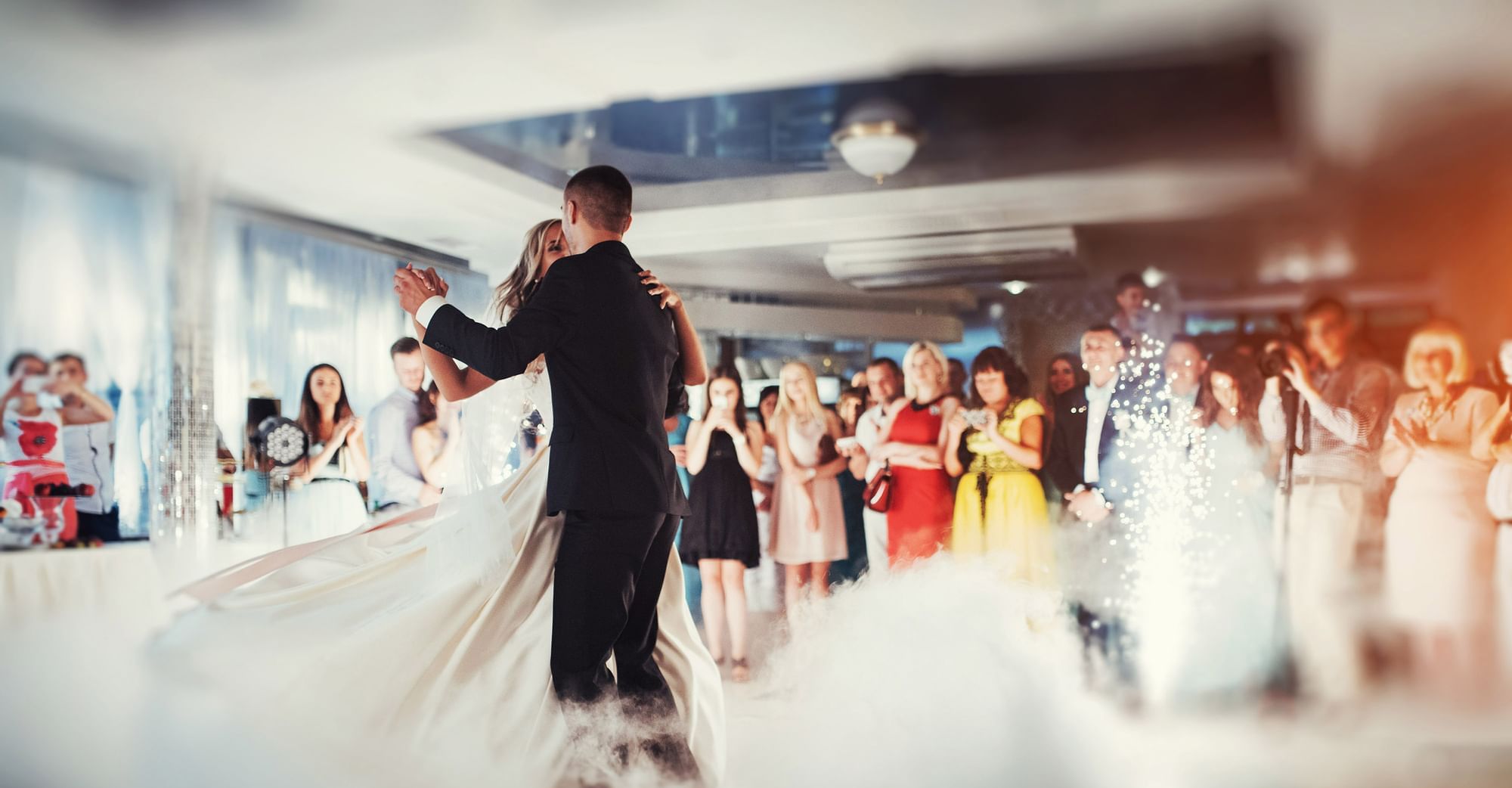 Bride & groom dancing in their wedding at Village Hotels