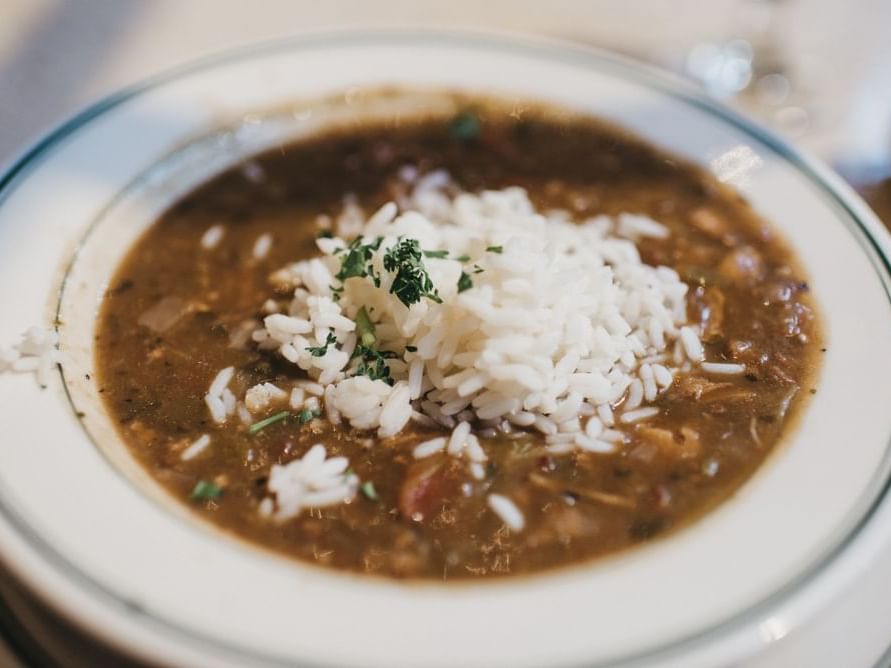 A dish of Gumbo in a restaurant at Windsong Resort On The Reef