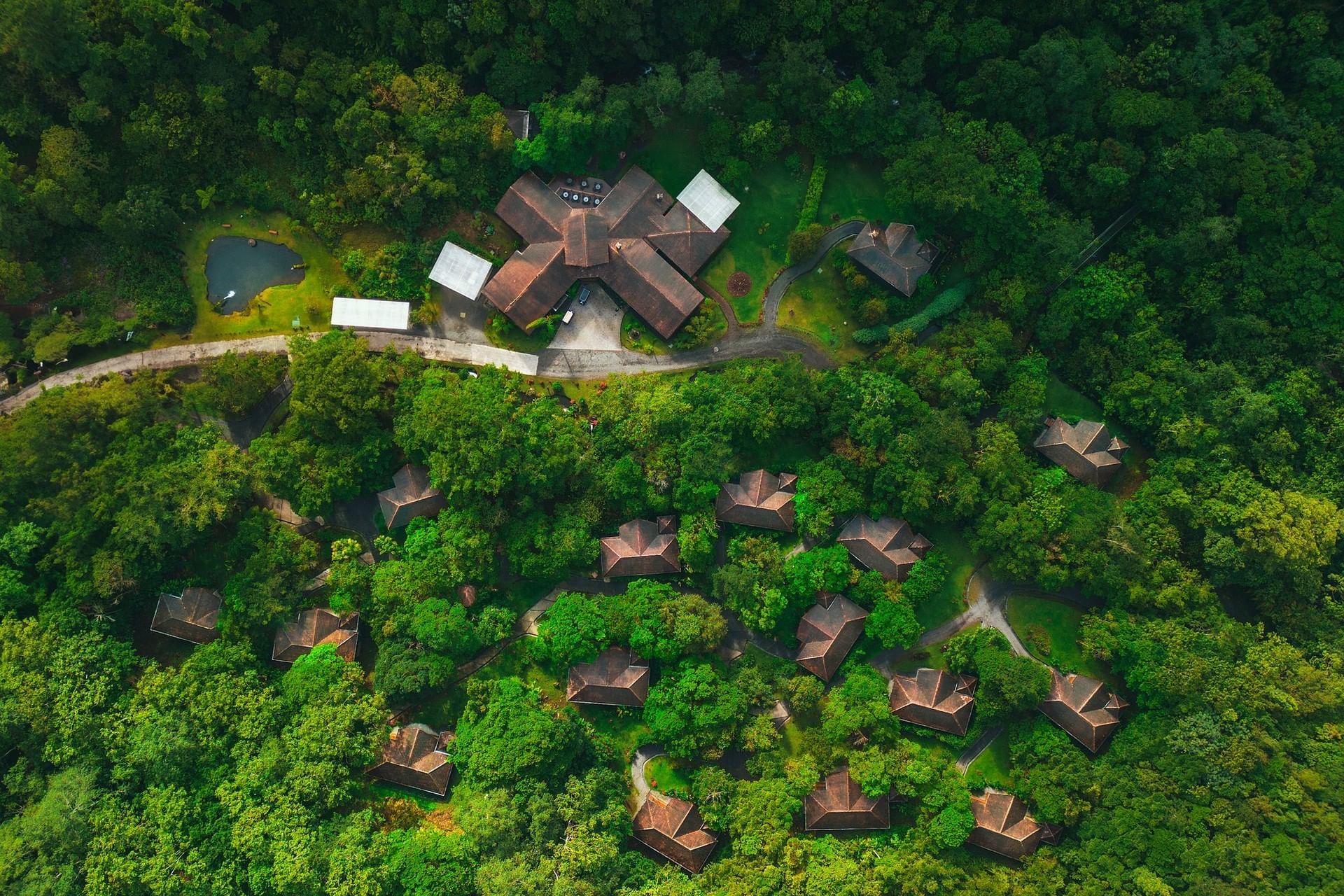 Aerial view of El Silencio Lodge & Spa surrounded by lush greenery