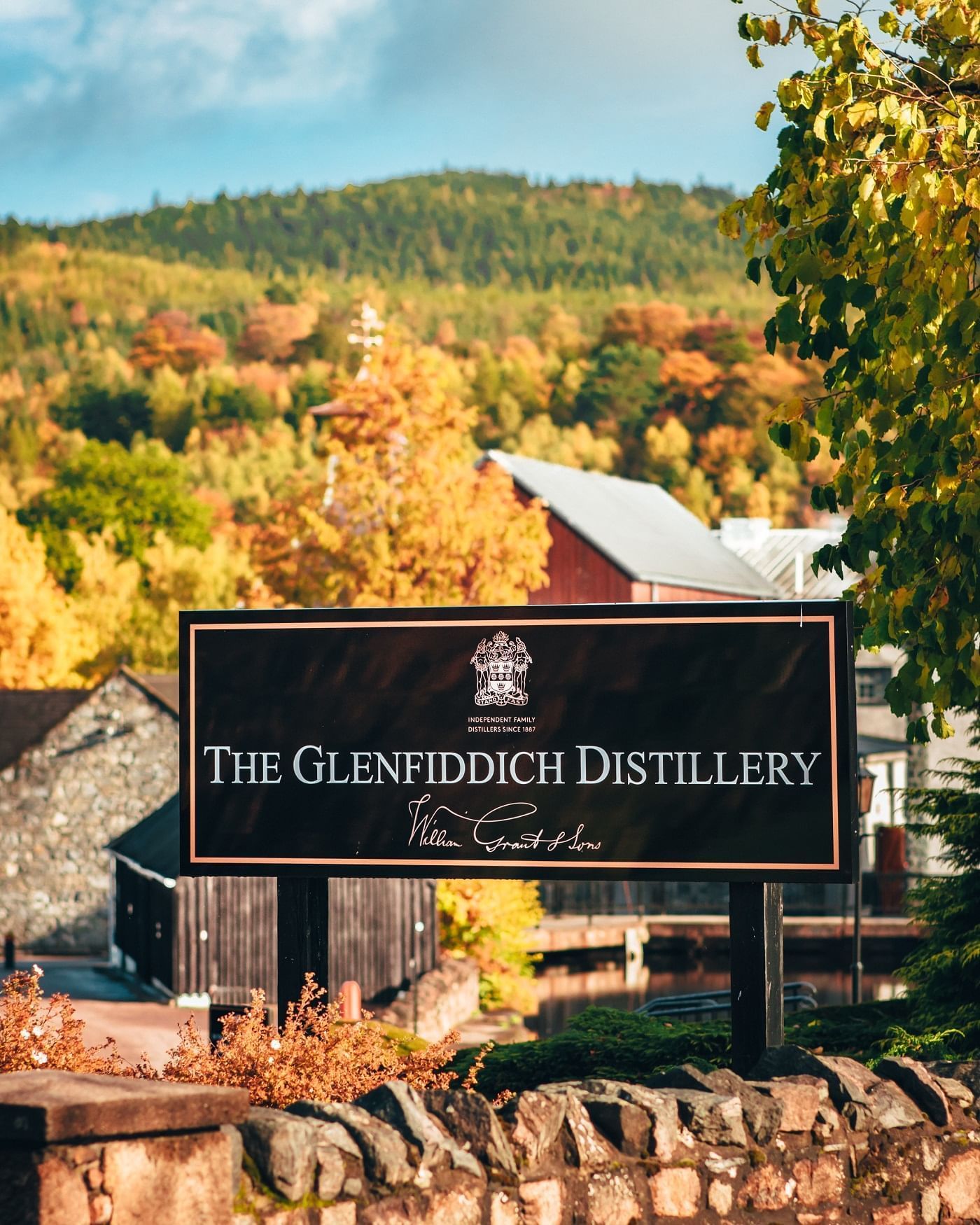 Entrance to Glenfiddich Distillery with beautiful mountain view near The Londoner Hotel