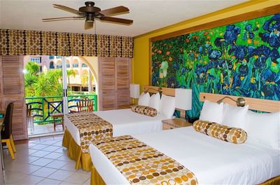 Interior of 2-Bedroom Pool View Suite with a balcony at Accra Hotels & Resorts