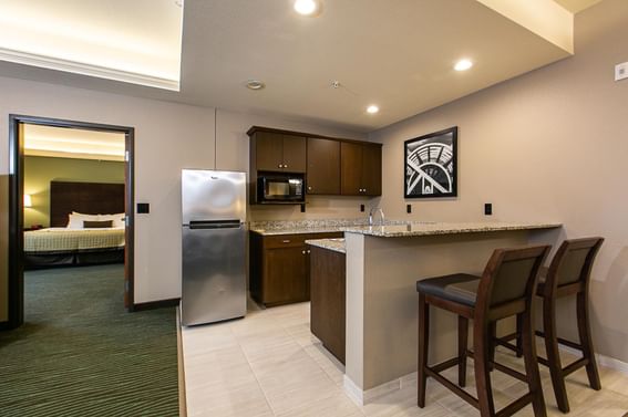 Modern kitchen with dining area King Executive Suite Lower Level at Off Shore Resort