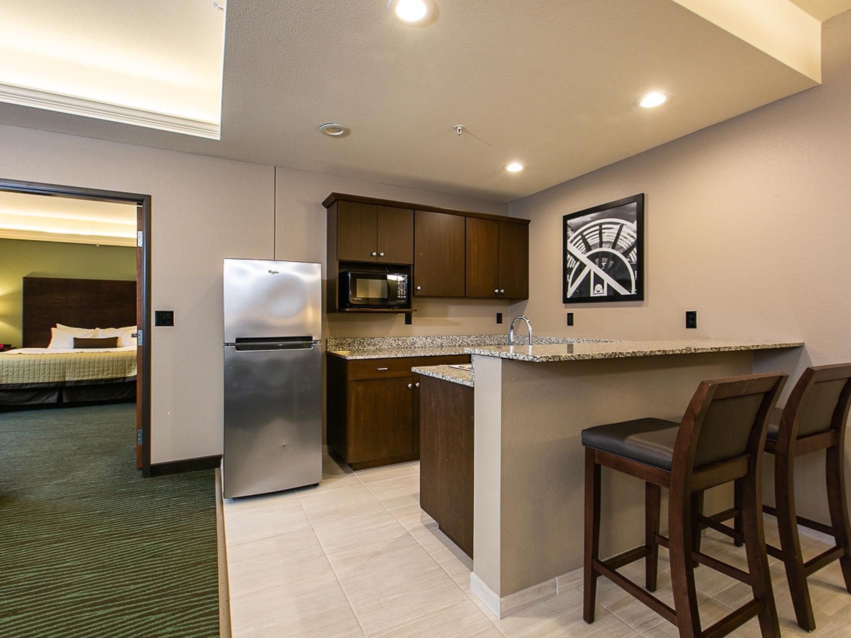 Modern kitchen with dining area King Executive Suite River View at Off Shore Resort