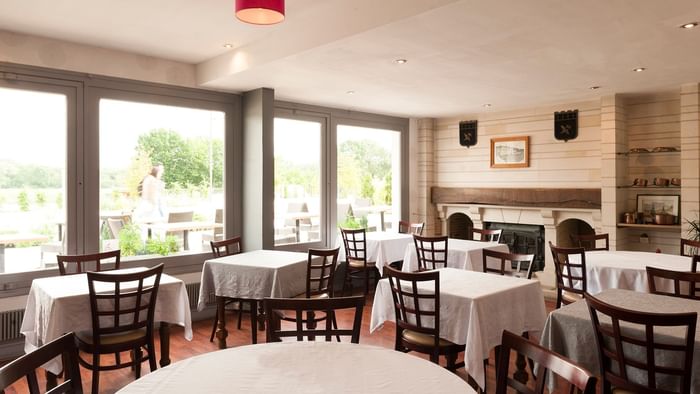 Interior of a dining area at Hotel Le Cheval Rouge