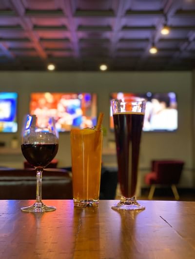 three drinks on a bar