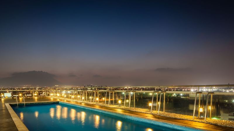 Rooftop pool at Fiesta Inn Monterrey Fundidora at night