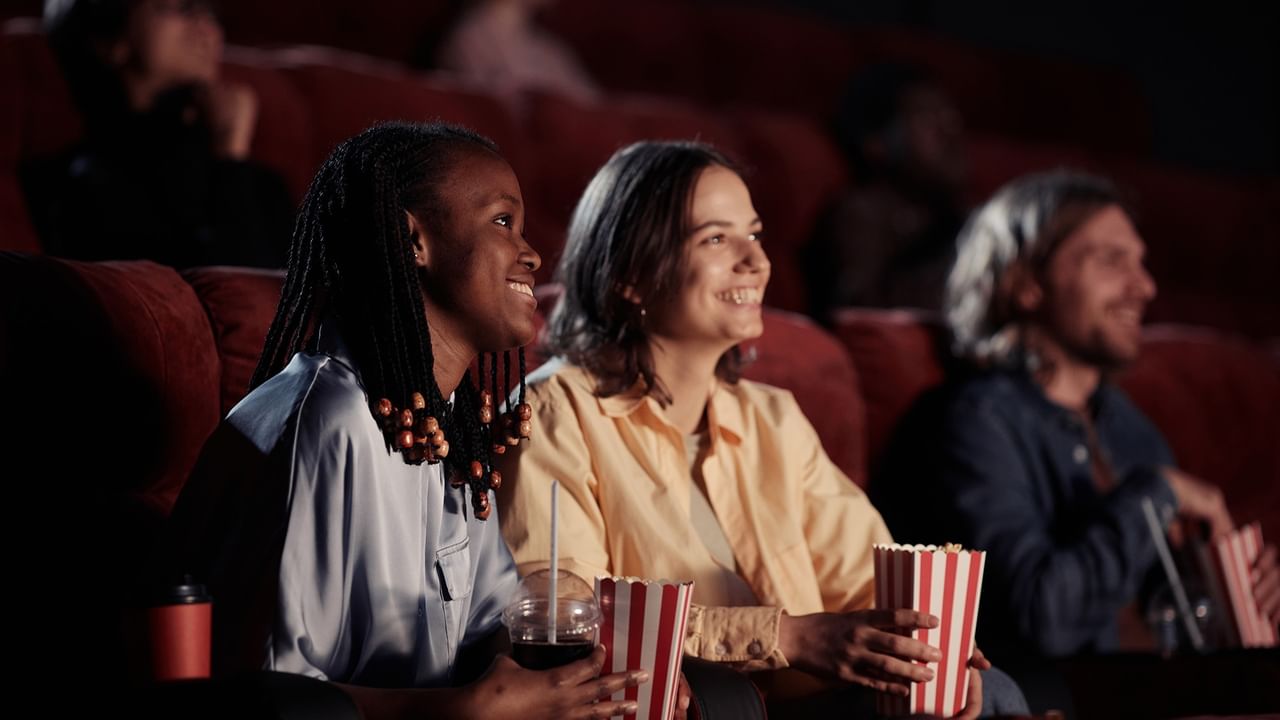 people watching a movie in a theater