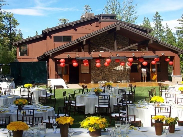 Big Pine Lawn set with tables and chairs for wedding reception 