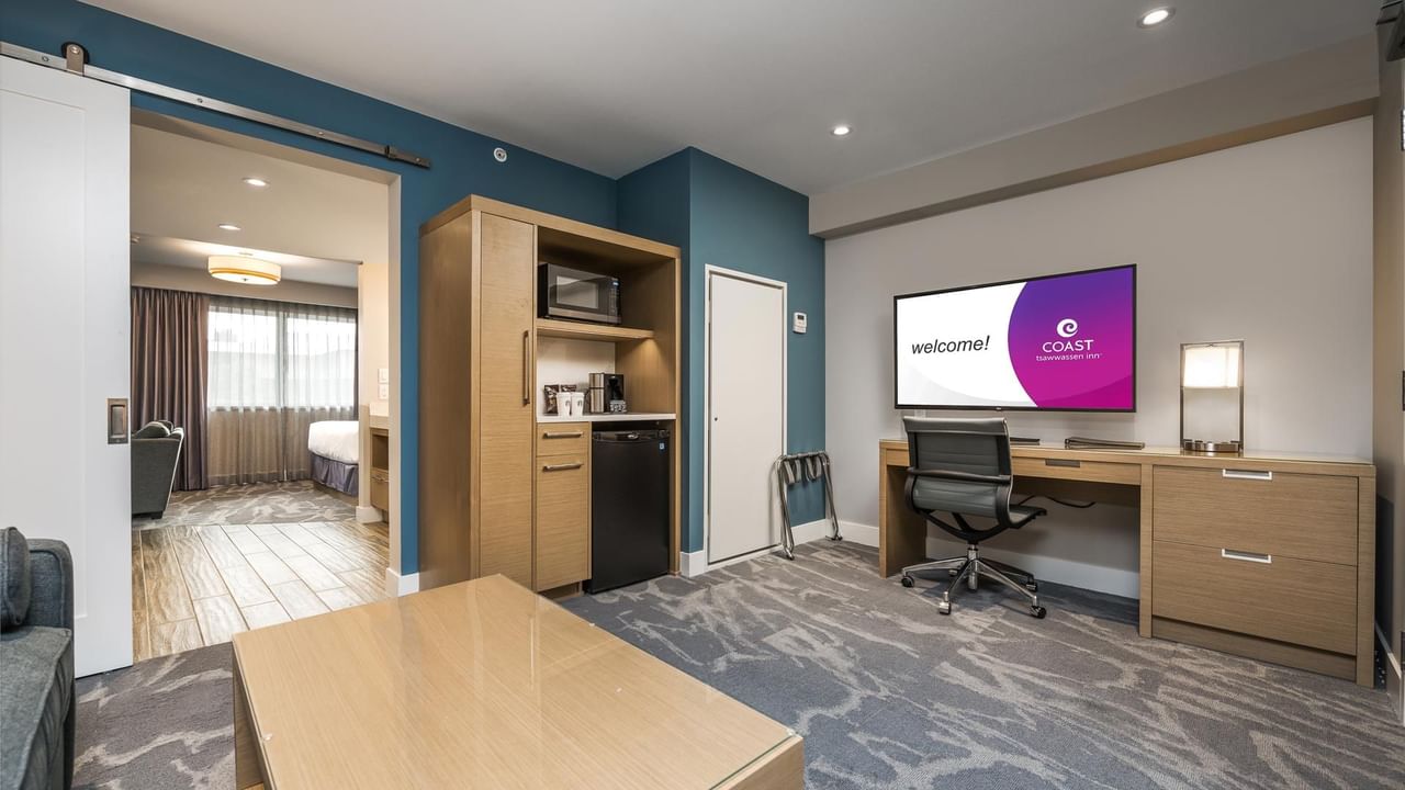Living room, kitchenette and work desk