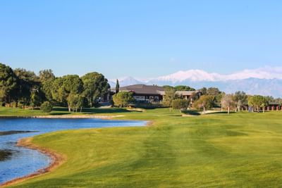 Titanic Golf Club lake, building and mountains