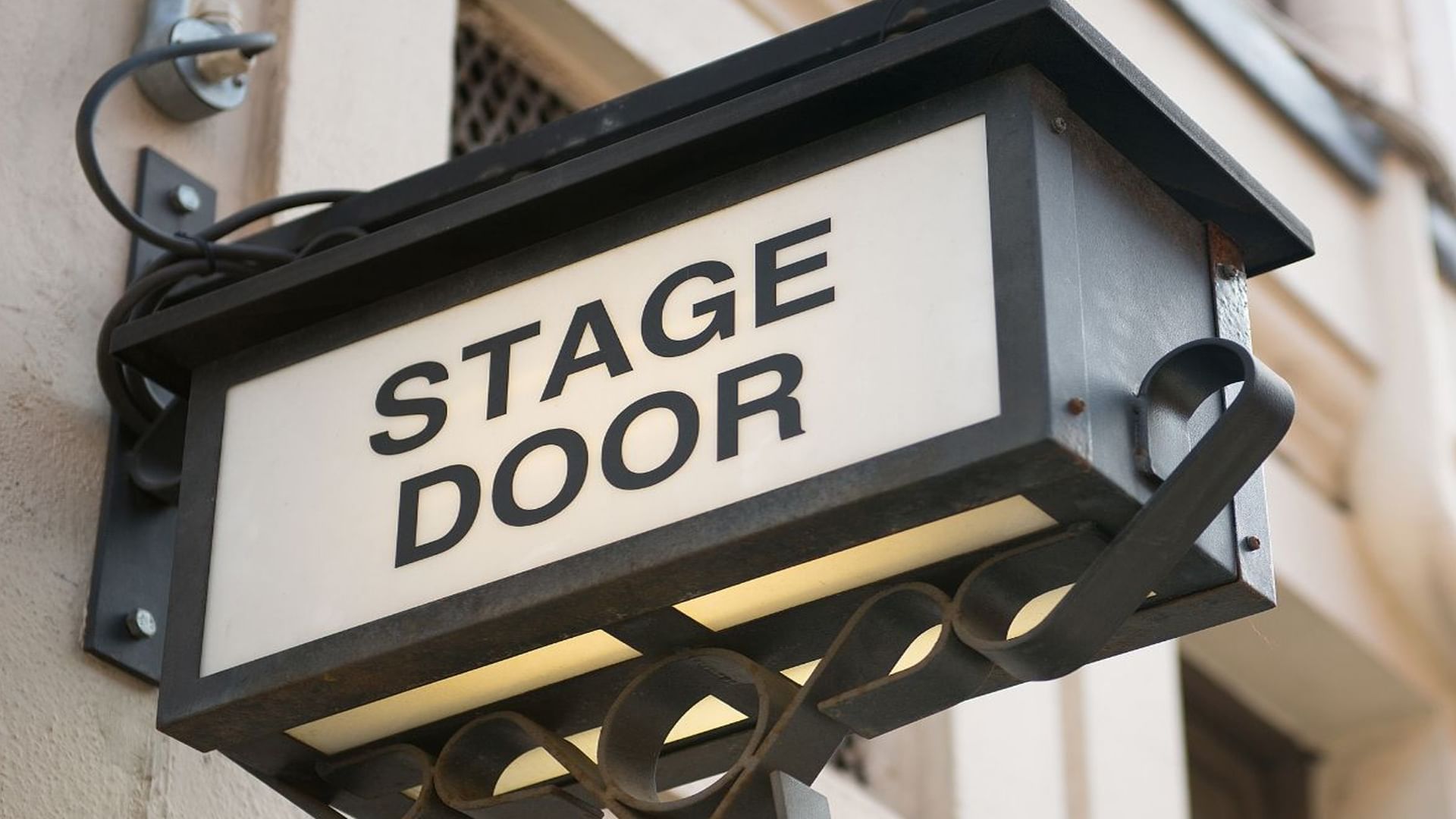 Close up image of Sign name of theatre near Village Hotels