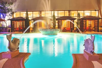 The water feature by the pool at MCM Elegante Beaumont