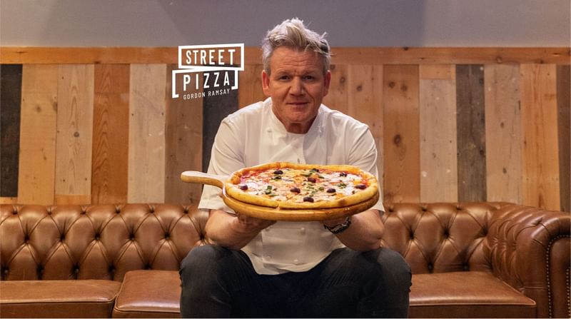 Banner of Gordon Ramsay holding a pizza in Gordon Ramsay Street Pizza at Sunway Resort