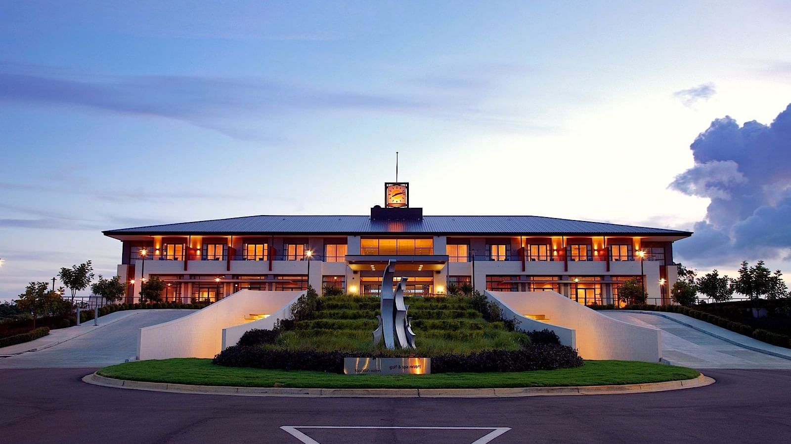 Evening exterior view of luxury golf resort