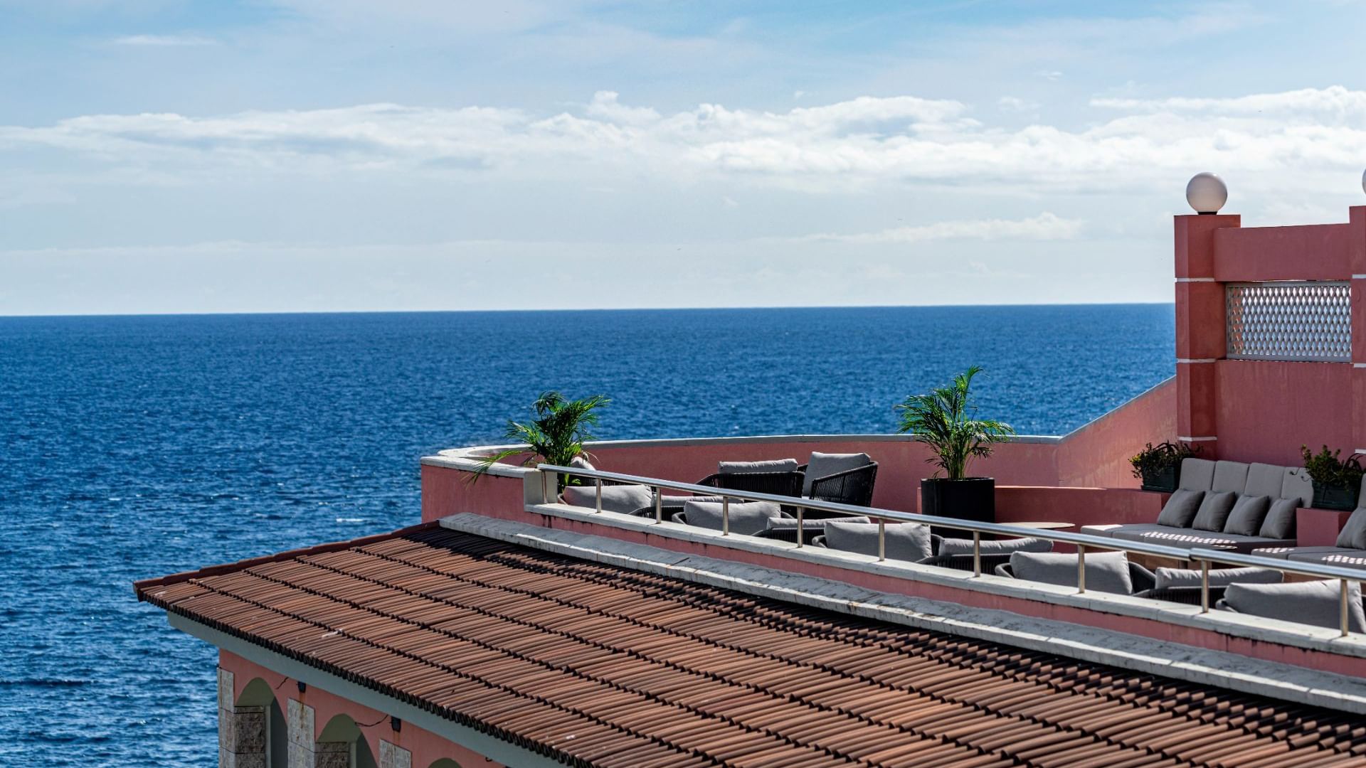 Exterior view of Monte Brasil Restaurant's rooftop dining area at Terceira Mar Hotel