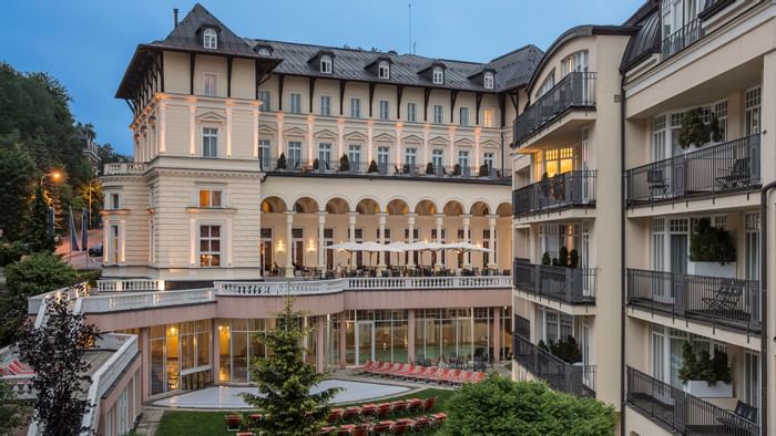 View of room balconies from the garden of Falkensteiner Hotels