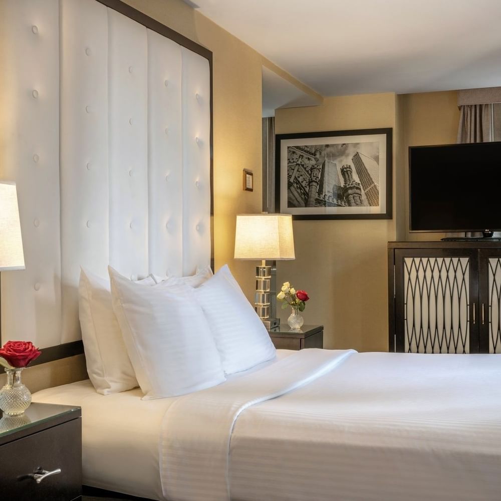 Elegant Executive King room with a large bed and modern decor at Warwick Allerton - Chicago.