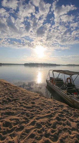 A man in a boat on the lake near Dar Es Saalam Serena Hotel