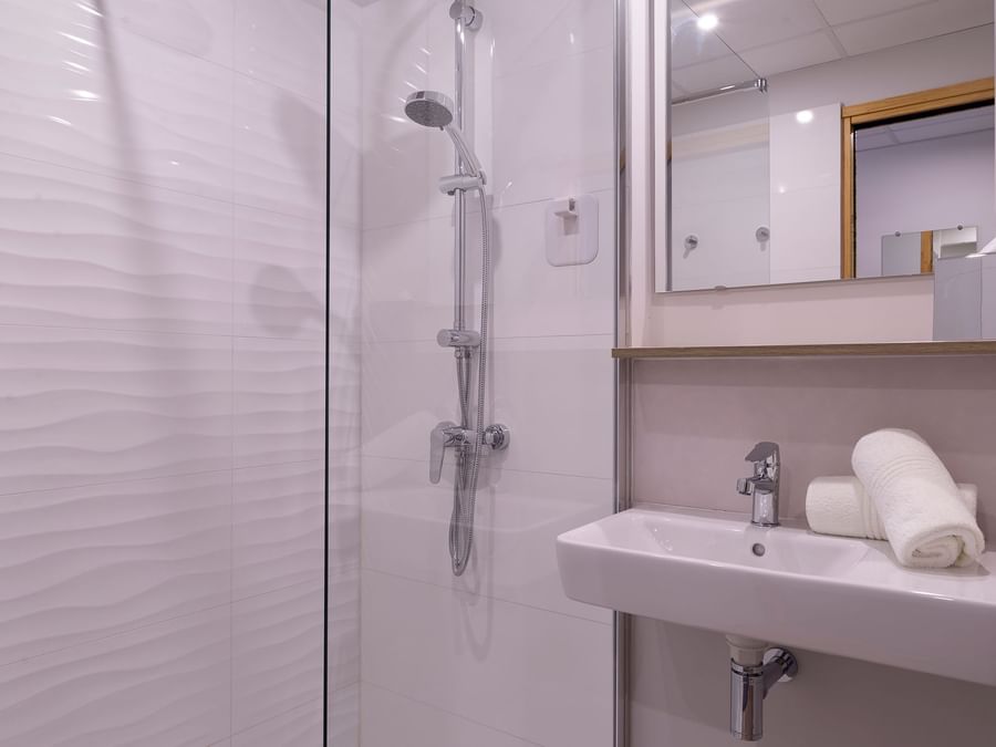 Bathroom vanity in bedrooms at Hotel de la Confluence