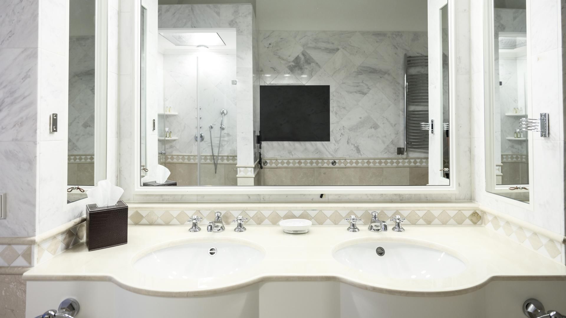 Bathroom vanity in Charly Walker Suite at Falkensteiner Hotels