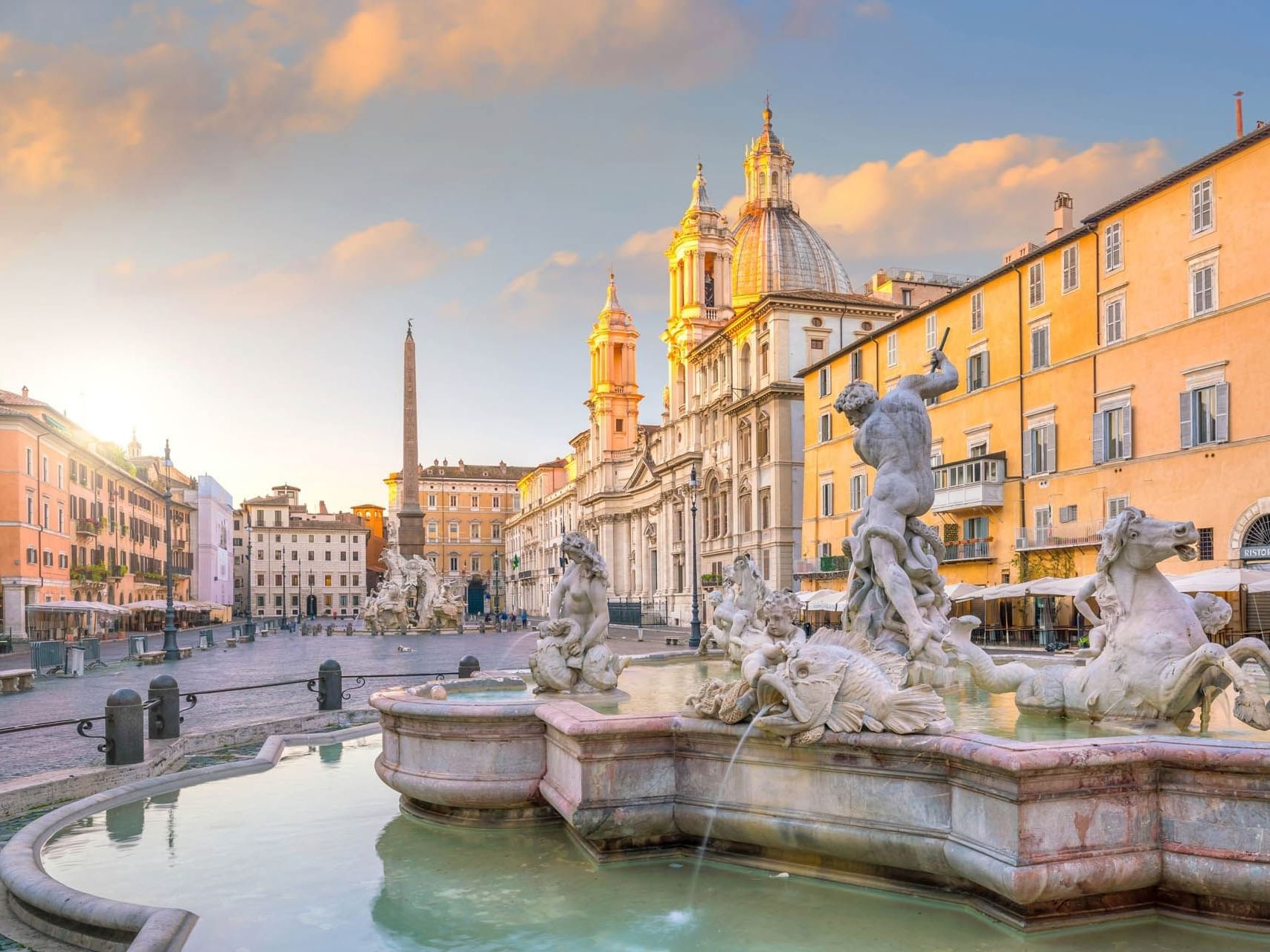 Landscape view of statues and fountain in Piazza Navona near The Independent