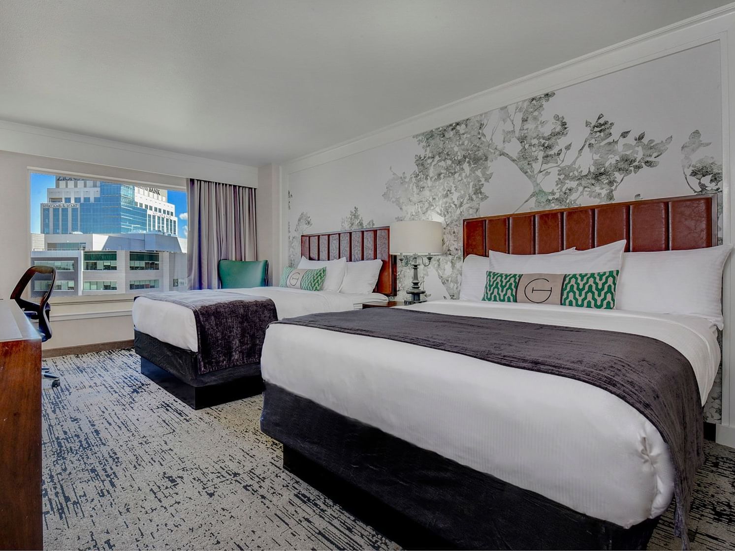 Two queen beds in Two Queen Deluxe bedroom at The Grove Hotel
