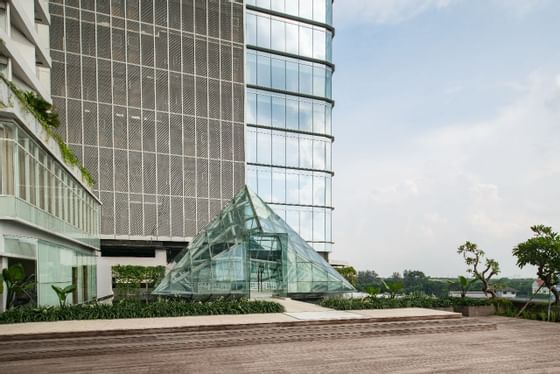 Triangular glass dome in front of Vasa Hotel Surabaya façade