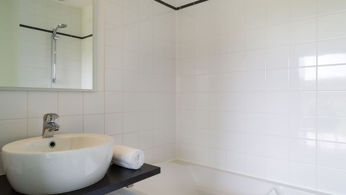 Bathroom vanity in bedrooms at Hotel Anaiade