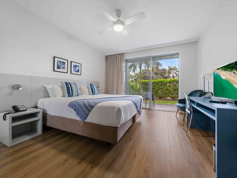 TV facing the king bed in Deluxe Studio Guestroom at Pullman Magenta Shores