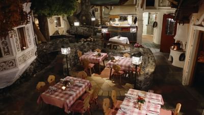 High-angle shot of Via Mala's dining area at Liebes Rot Flueh