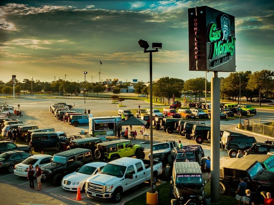 Parking of Gas Monkey and Grill near MCM Elegante Suites