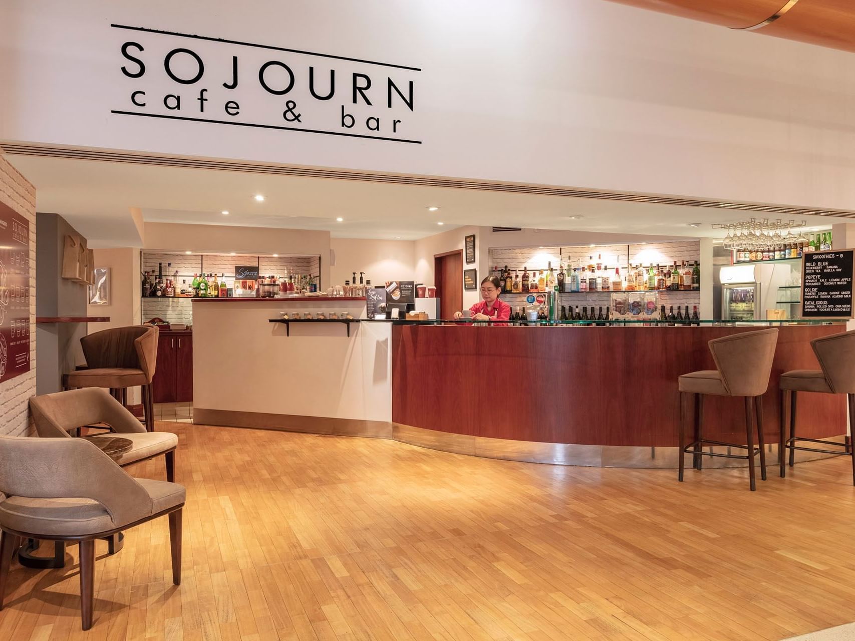 Counter & lounge area with wooden interior in Sojourn Restaurant & Bar at James Cook Hotel