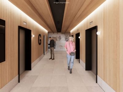 People walking in a corridor with a G logo at UniLodge Brisbane City.