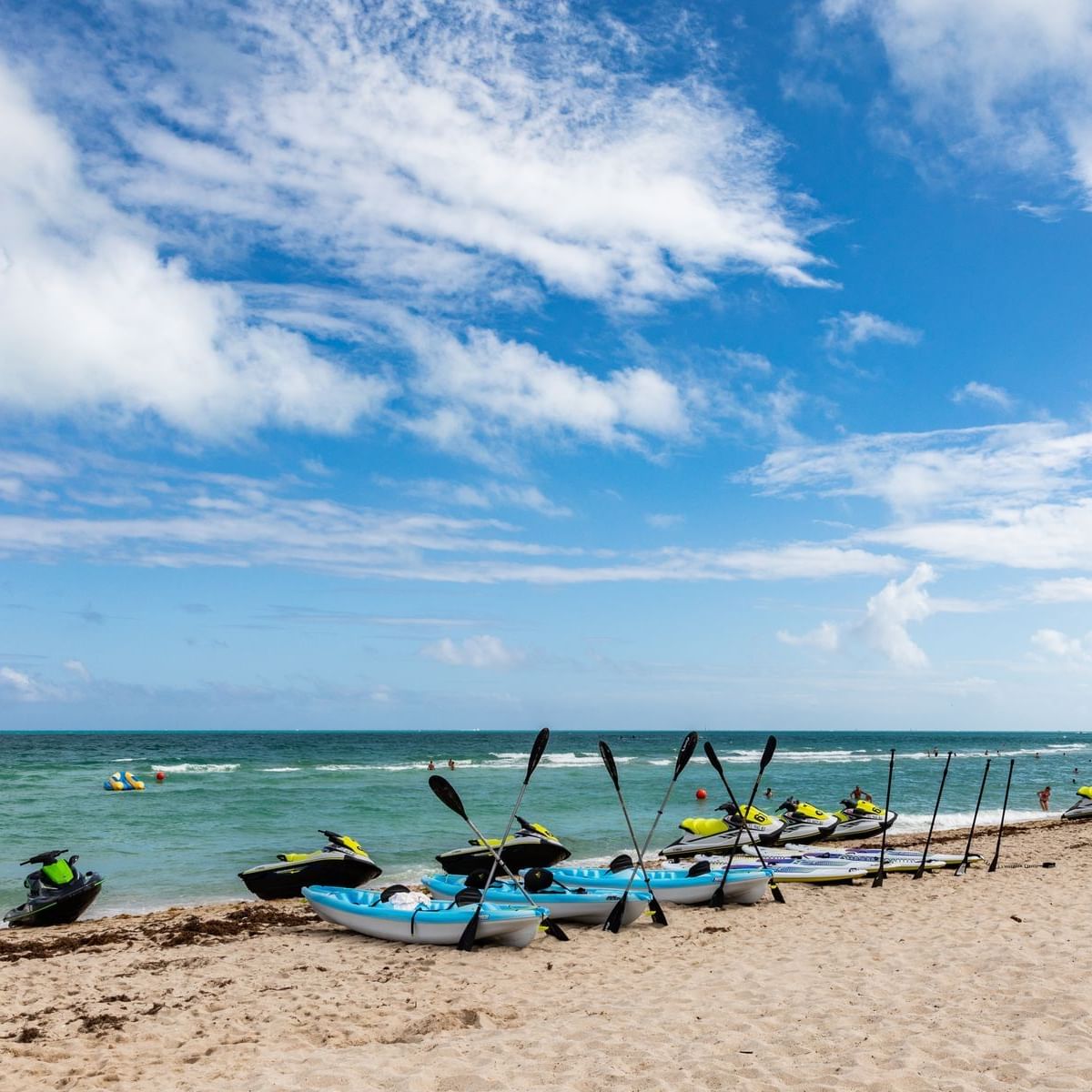 View of Kayaks Parked on the beach near DOT Hotels