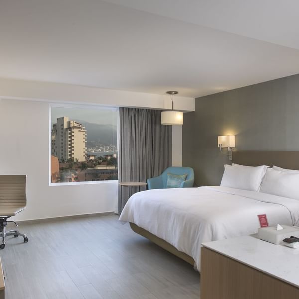 Interior of Superior Room with working desk at Fiesta Inn