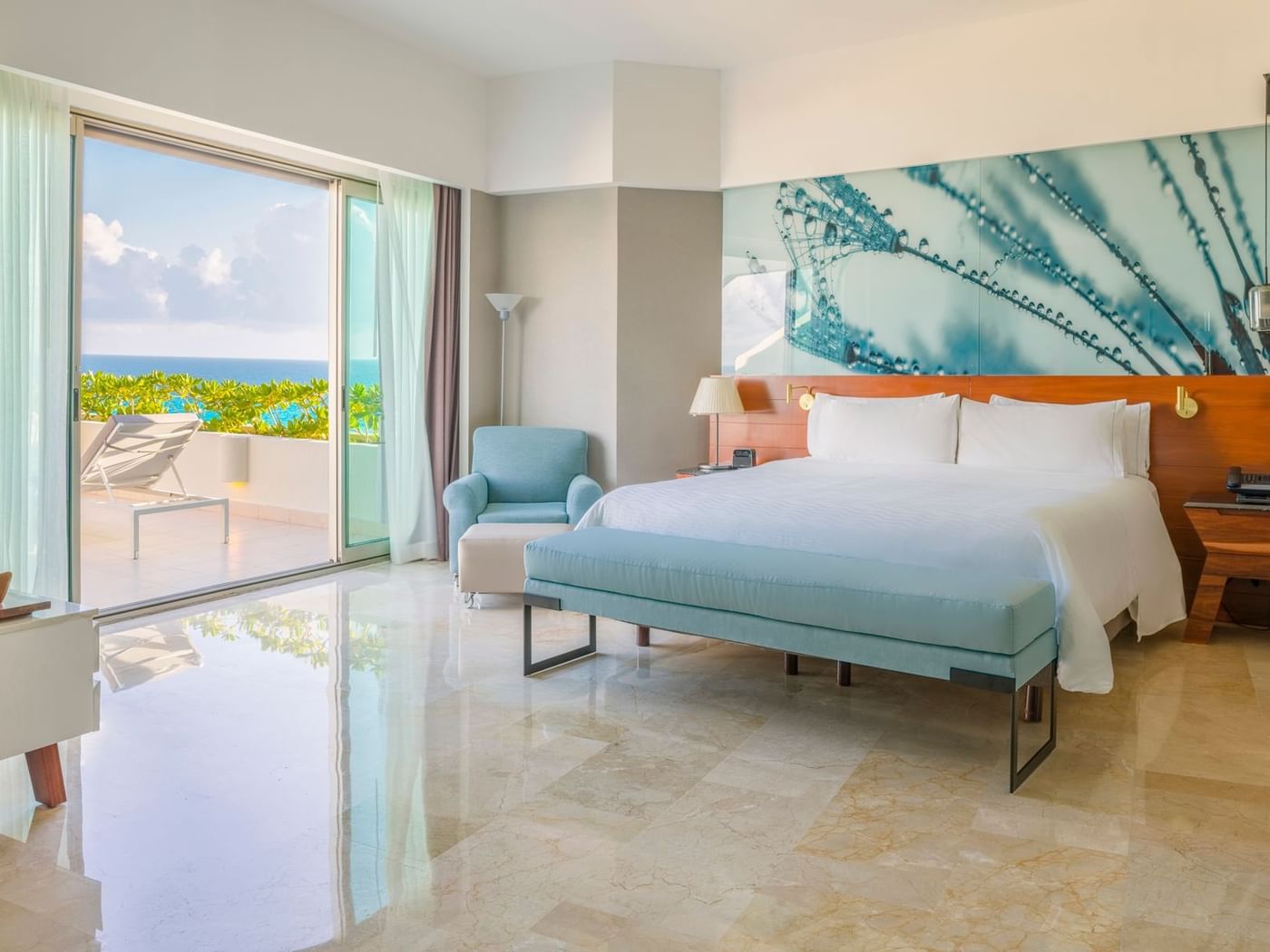 Honeymoon Suite bedroom with balcony area at Live Aqua Beach Resort Cancun
