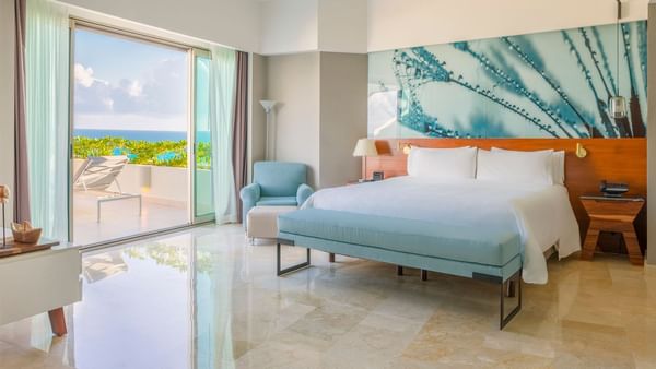 Honeymoon Suite bedroom with balcony area at Live Aqua Beach Resort Cancun