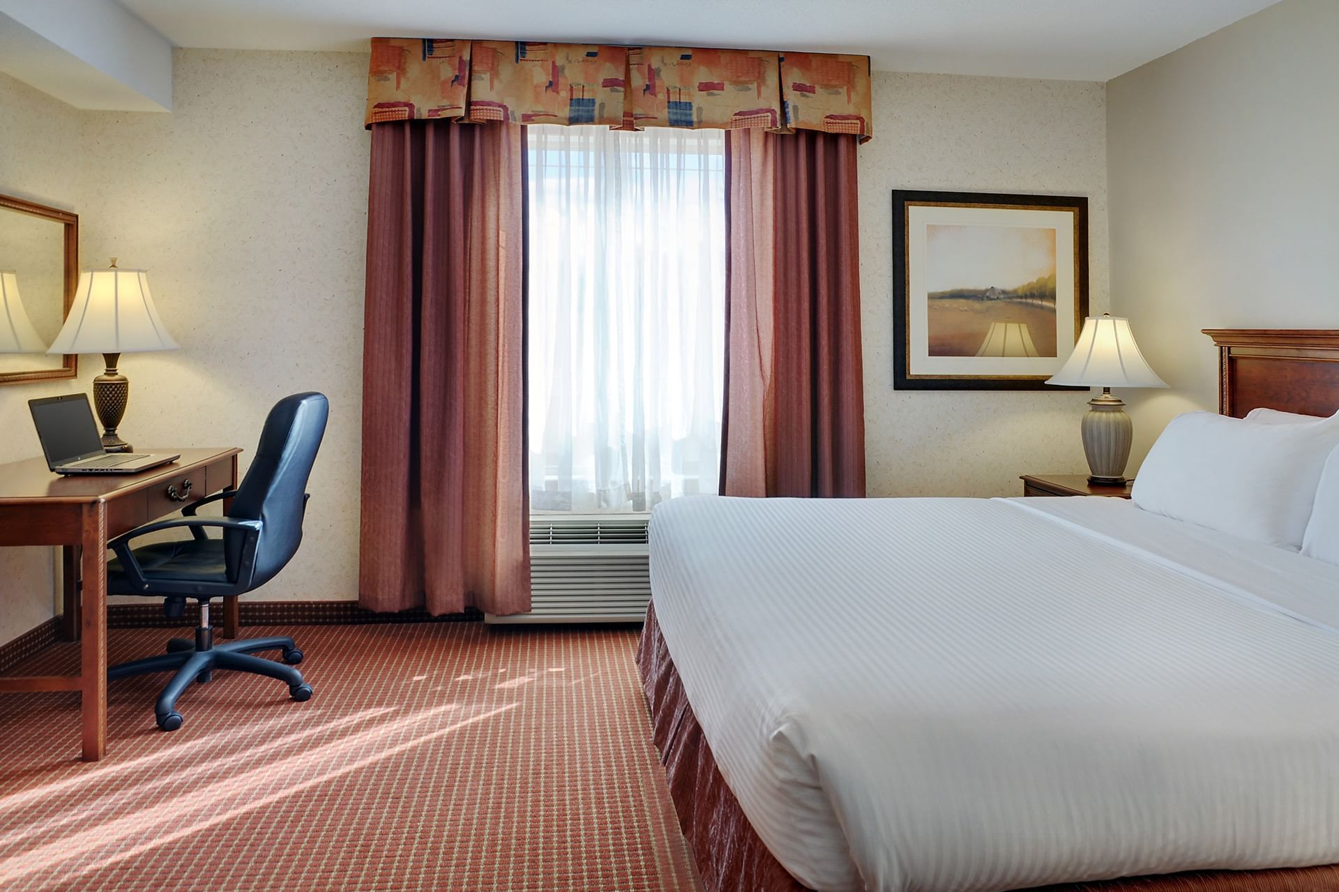 Grimshaw Hotel room with king bed