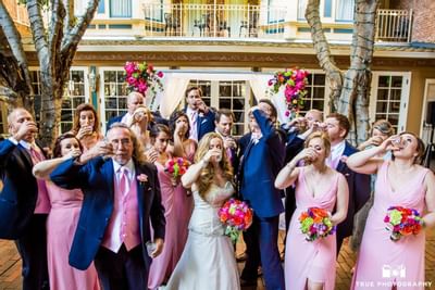 People drinking at a wedding party at Horton Grand Hotel